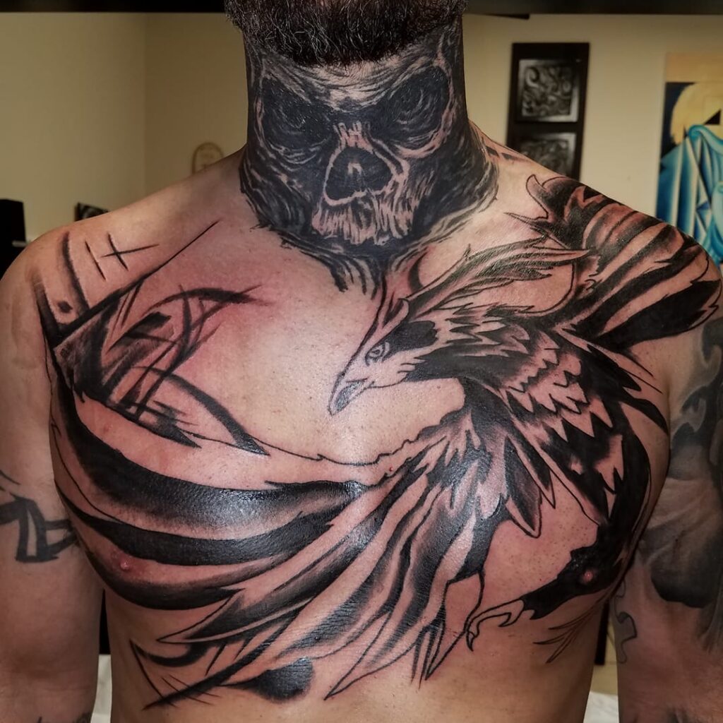 Large Bird Chest Tattoo